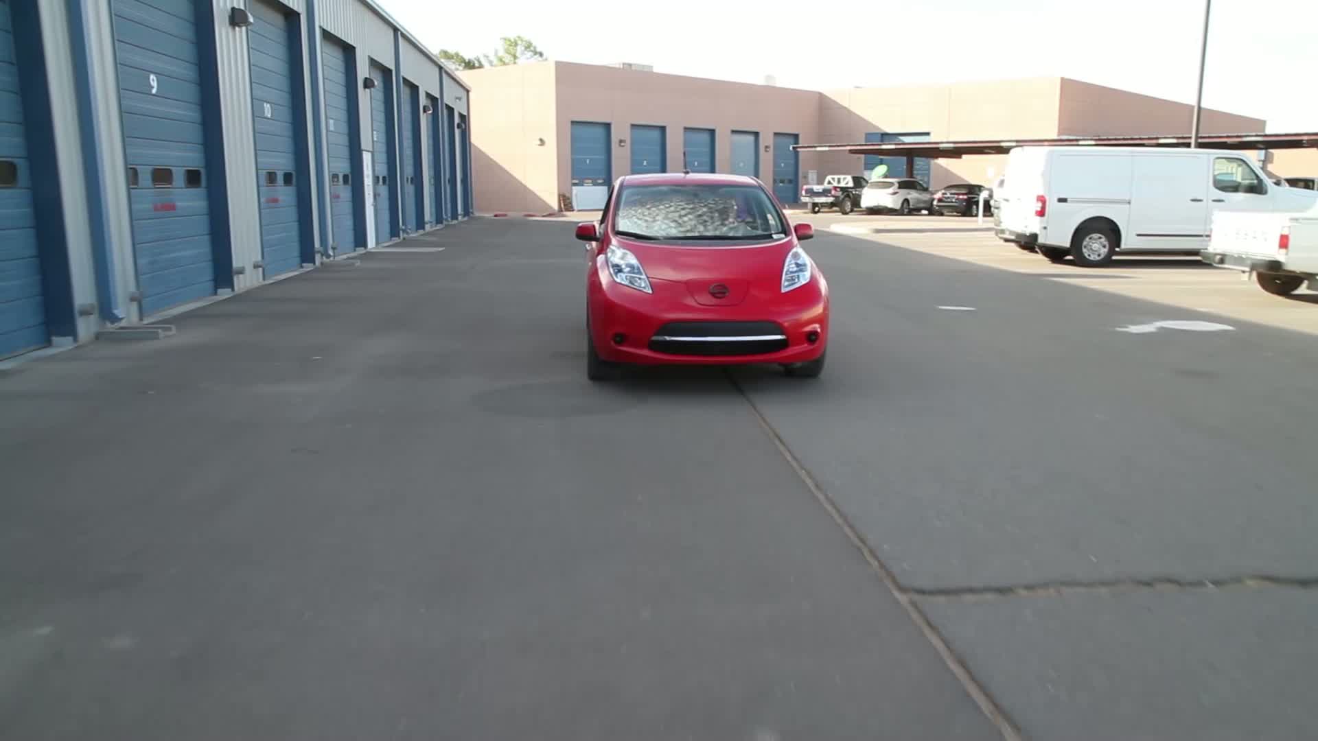 REPORT (video elements only): Nissan engineers marry a LEAF to a Frontier for use around the shop